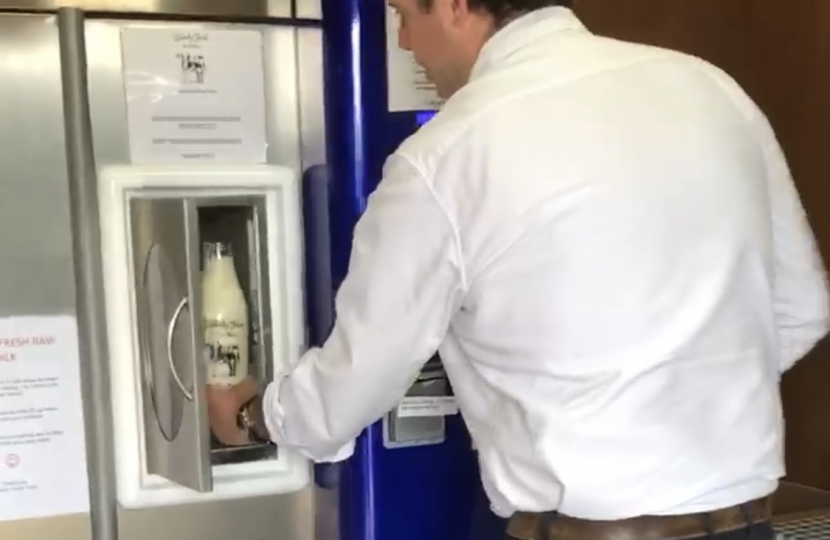 Greg buys a litre of raw milk from the Udderly Fresh vending machine.