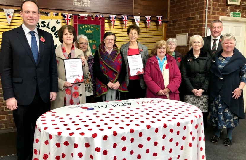 Greg presents Winslow WI and Winslow Earlybirds WI with certificates from the Royal British Legion