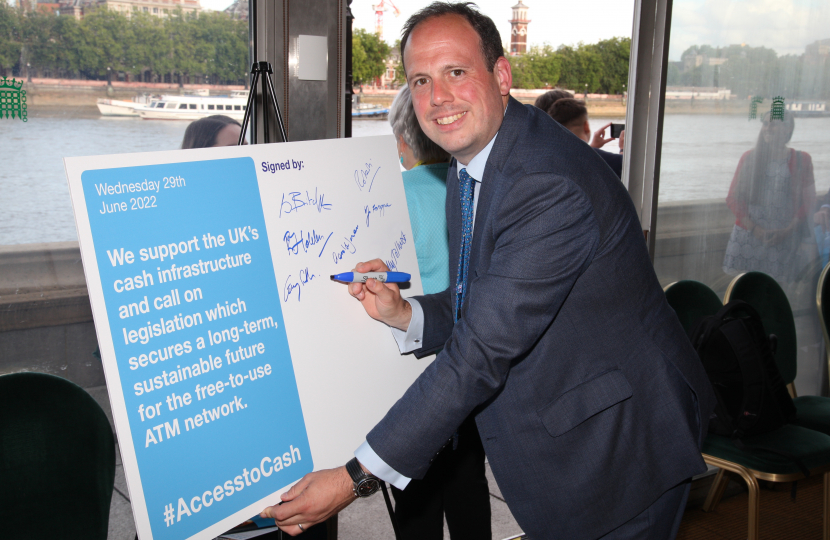 MP signs pledge to protect free access to cash for Bucks residents 