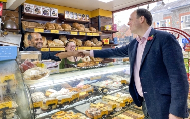 Greg wants to ensure our high streets flourish with independent traders.   He’s pictured here meeting staff at  Godwin’s Bakery, Princes Risborough.